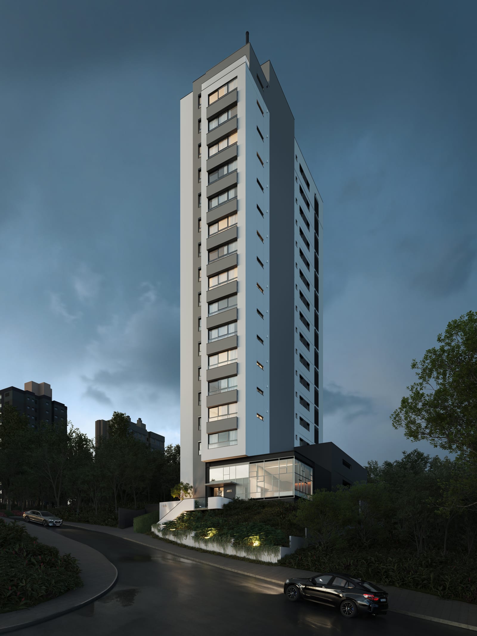 Render noturno de uma torre residencial esbelta, com a portaria iluminada e a rua molhada em primeiro plano